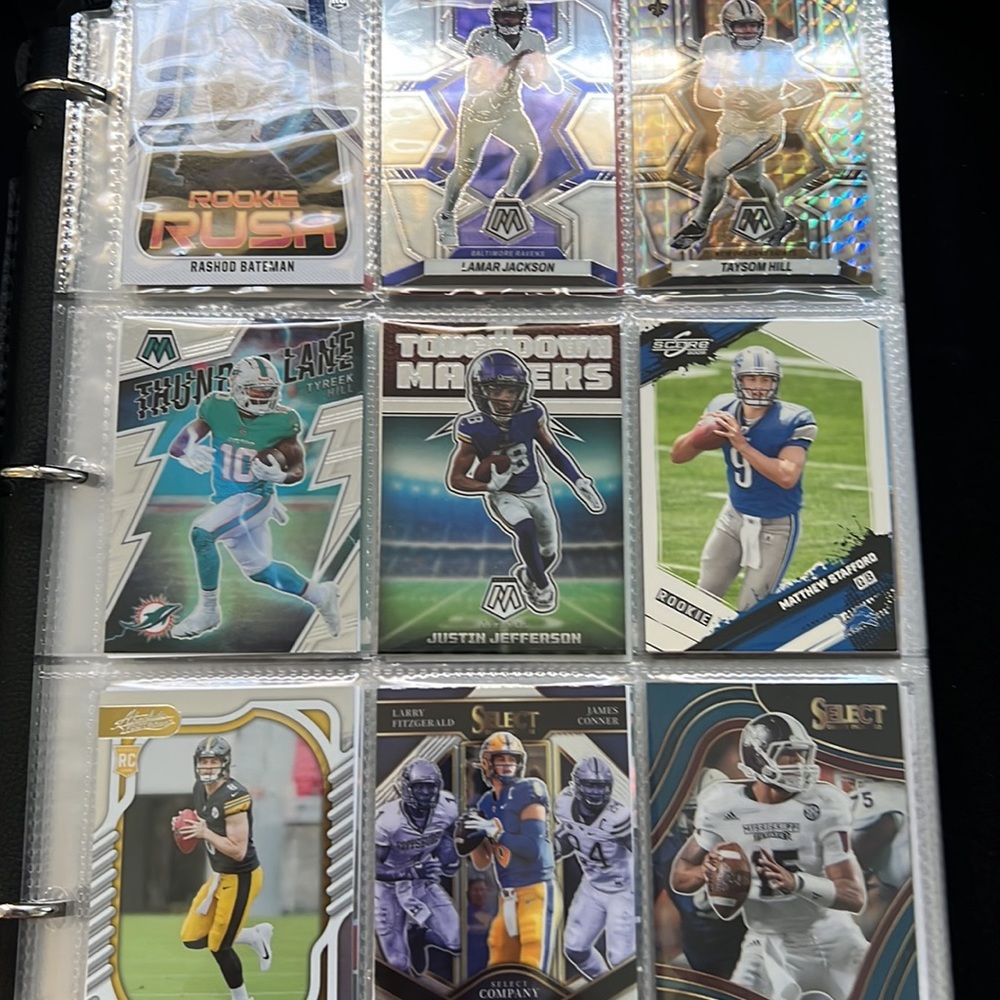15 cards per mystery pack, baseball, football, and basketball.